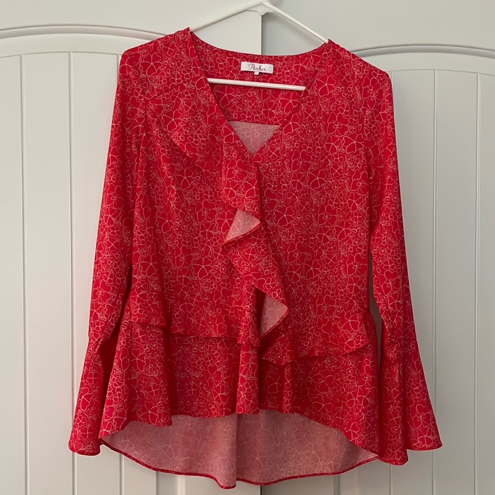 Parker, Red ruffled top with bell sleeves.